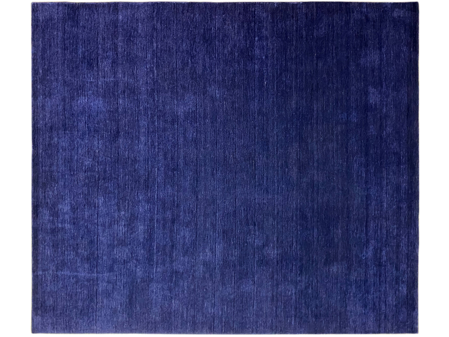 Uni Wollteppich Loom Luri in tiefem Blauton