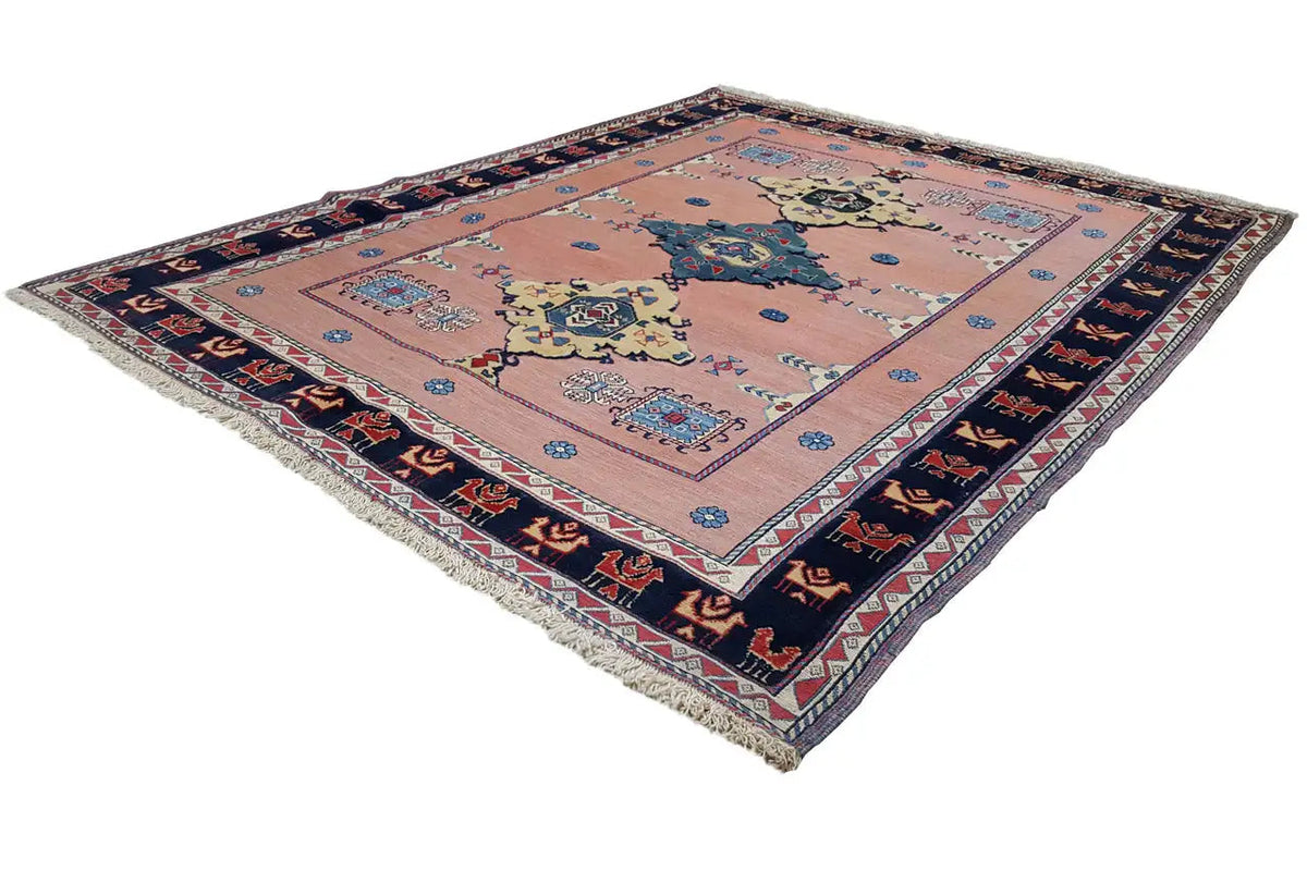Tapete oriental com design geométrico de medalhão em rosa, azul e azul-escuro, borda