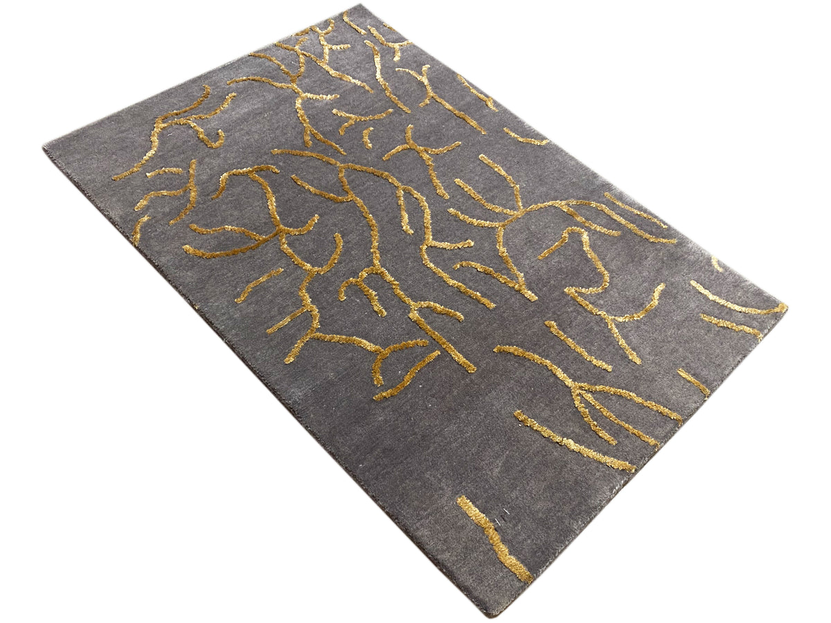 Designer-Teppich 91x62 cm, graues Rechteck mit gelben Linienornamenten