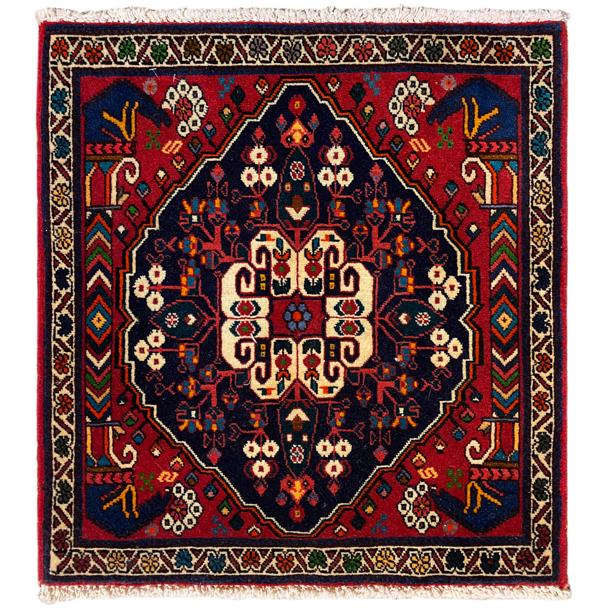 Tapete Poshti 66x62 cm: padrão geométrico em azul/vermelho com franjas