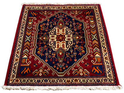 Tapete 63x60 cm, retangular, centro azul-escuro com moldura ornamental colorida