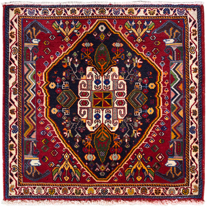 Tapete Poshti (67×67 cm) com fundo escuro, borda e medalhão geométrico