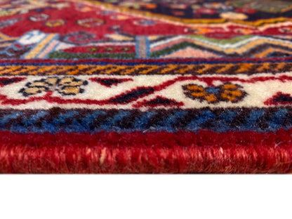 Tapete Poshti: costura das franjas e ourela com gradiente de azul para vermelho