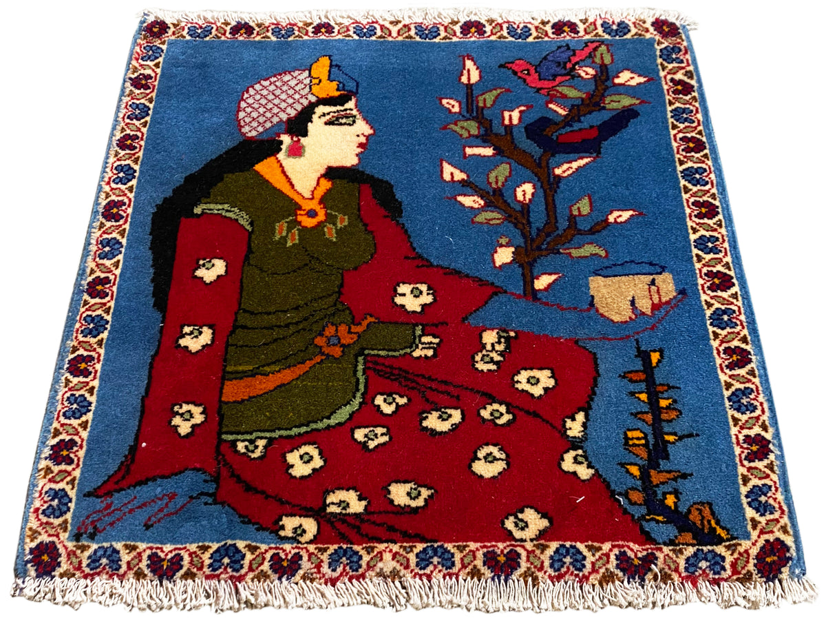 Tapete Poshti 65x63 cm com motivo de conto de fadas, área azul, parte central vermelha e franjas