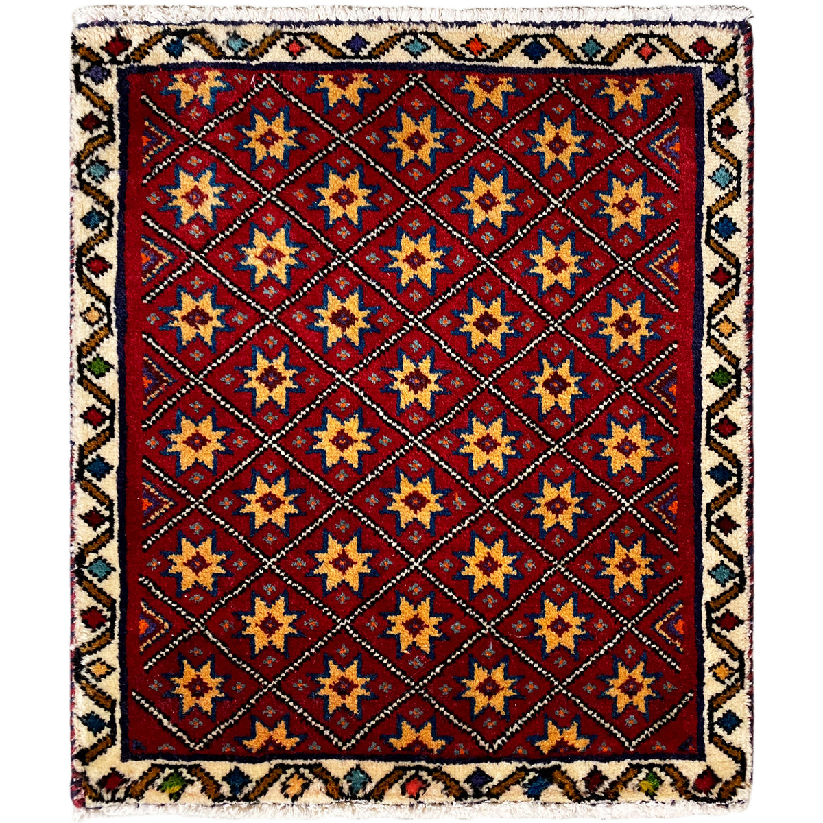 Tapete quadrado com fundo vermelho e padrão geométrico de estrelas multicoloridas