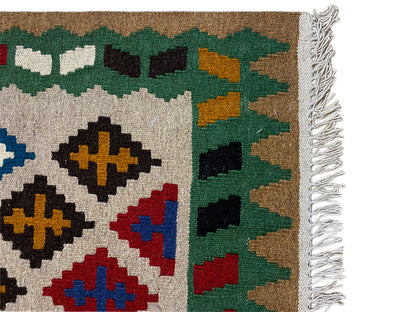 Naturwolle Kelim Teppich in Grün bunt gemustert handgefertigt